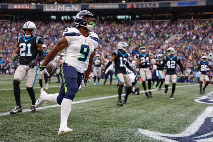 Sep 24, 2023; Seattle, Washington, USA; Seattle Seahawks running back Kenneth Walker III (9) celebrates after rushing for a touchdown against the Carolina Panthers during the fourth quarter at Lumen Field. Mandatory Credit: Joe Nicholson-USA TODAY Sports